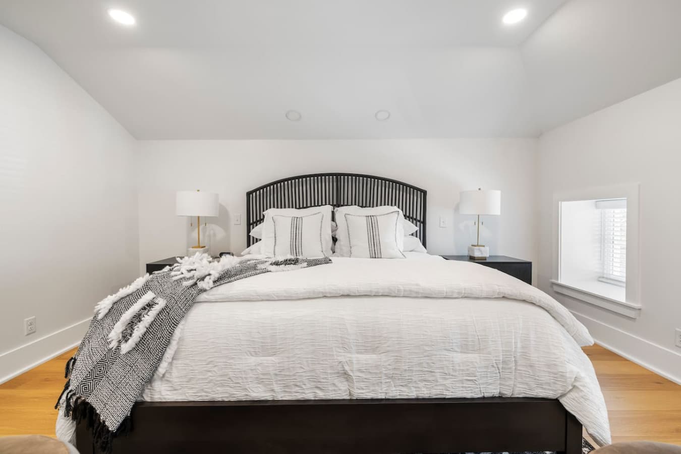 Cozy king bed in the master bedroom.