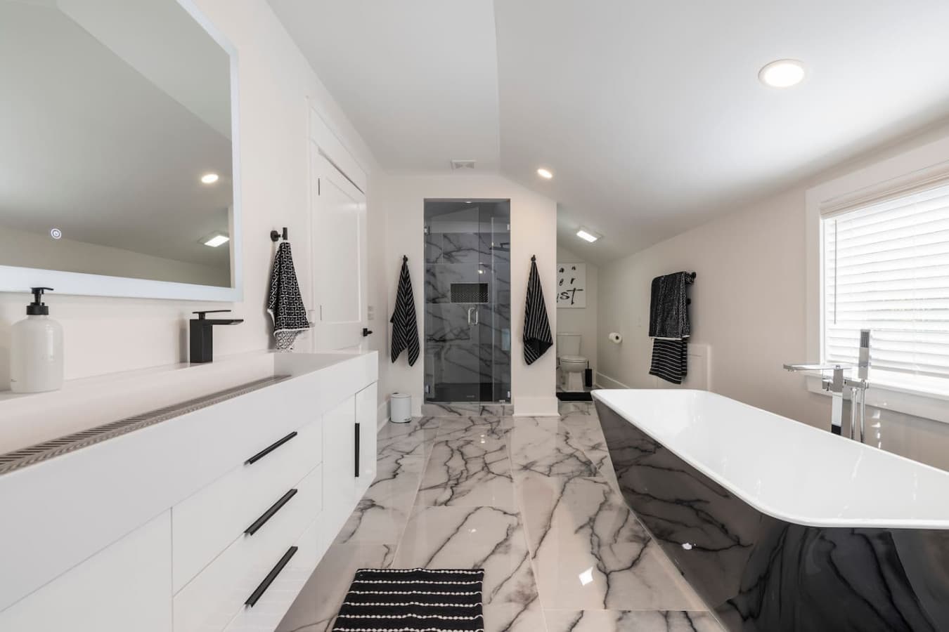 Master bathroom with soaking tub and walk in shower.