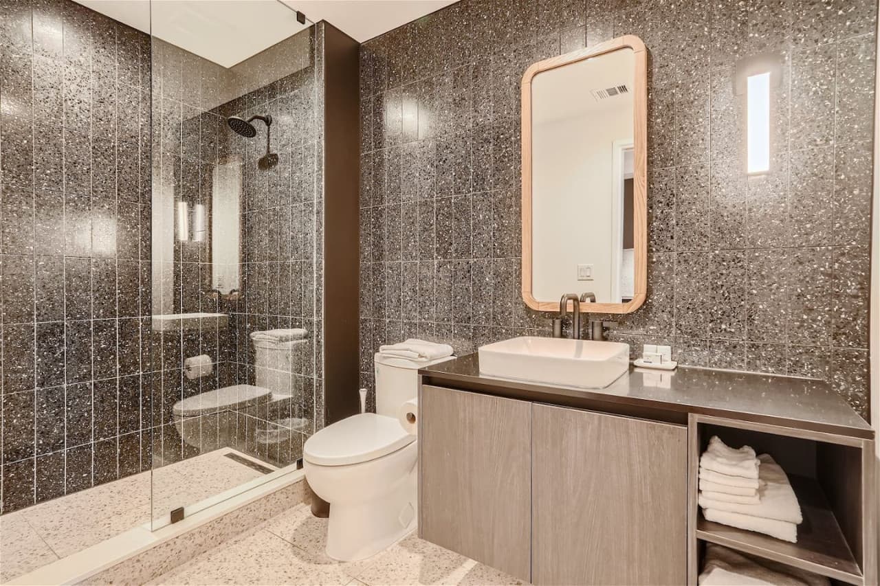 Bathroom with step in shower.
