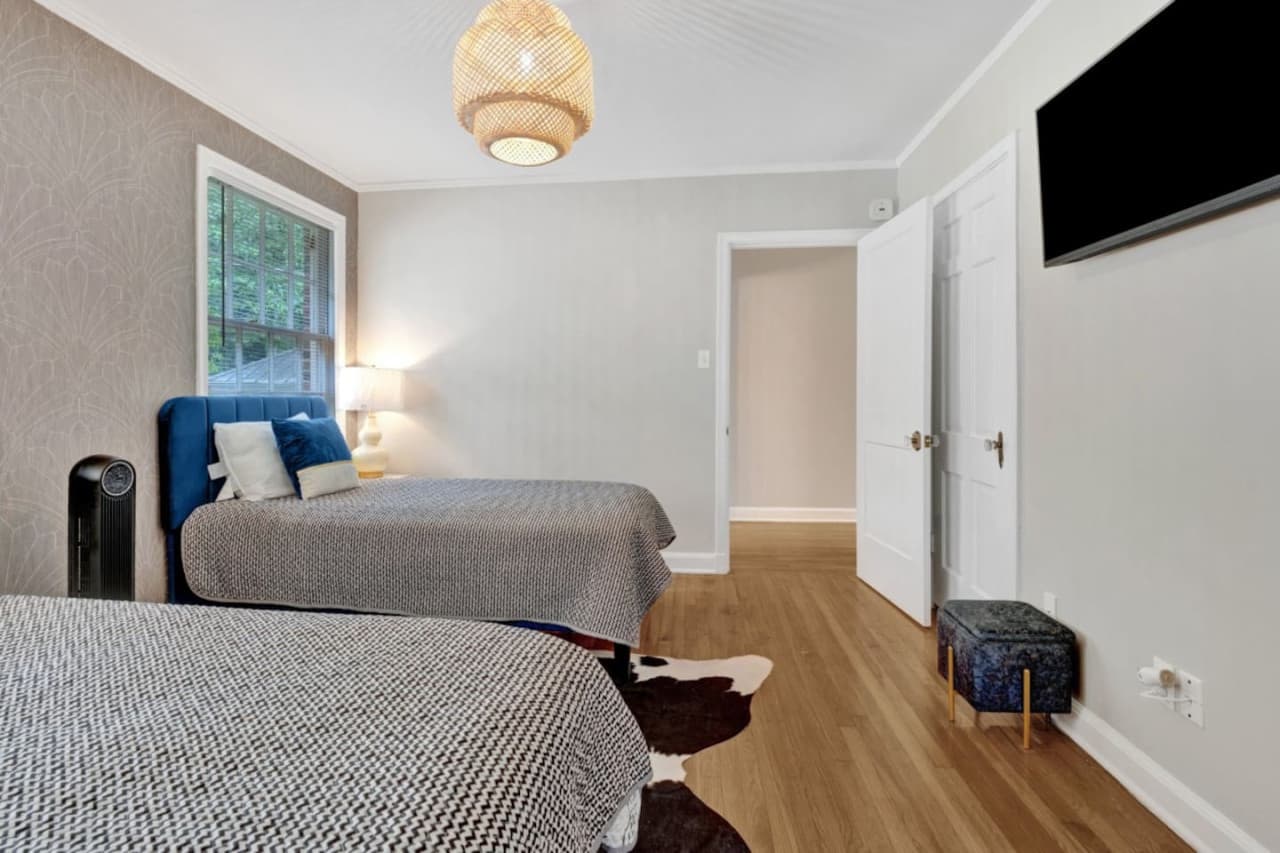 Smart TV for streaming in the third bedroom.
