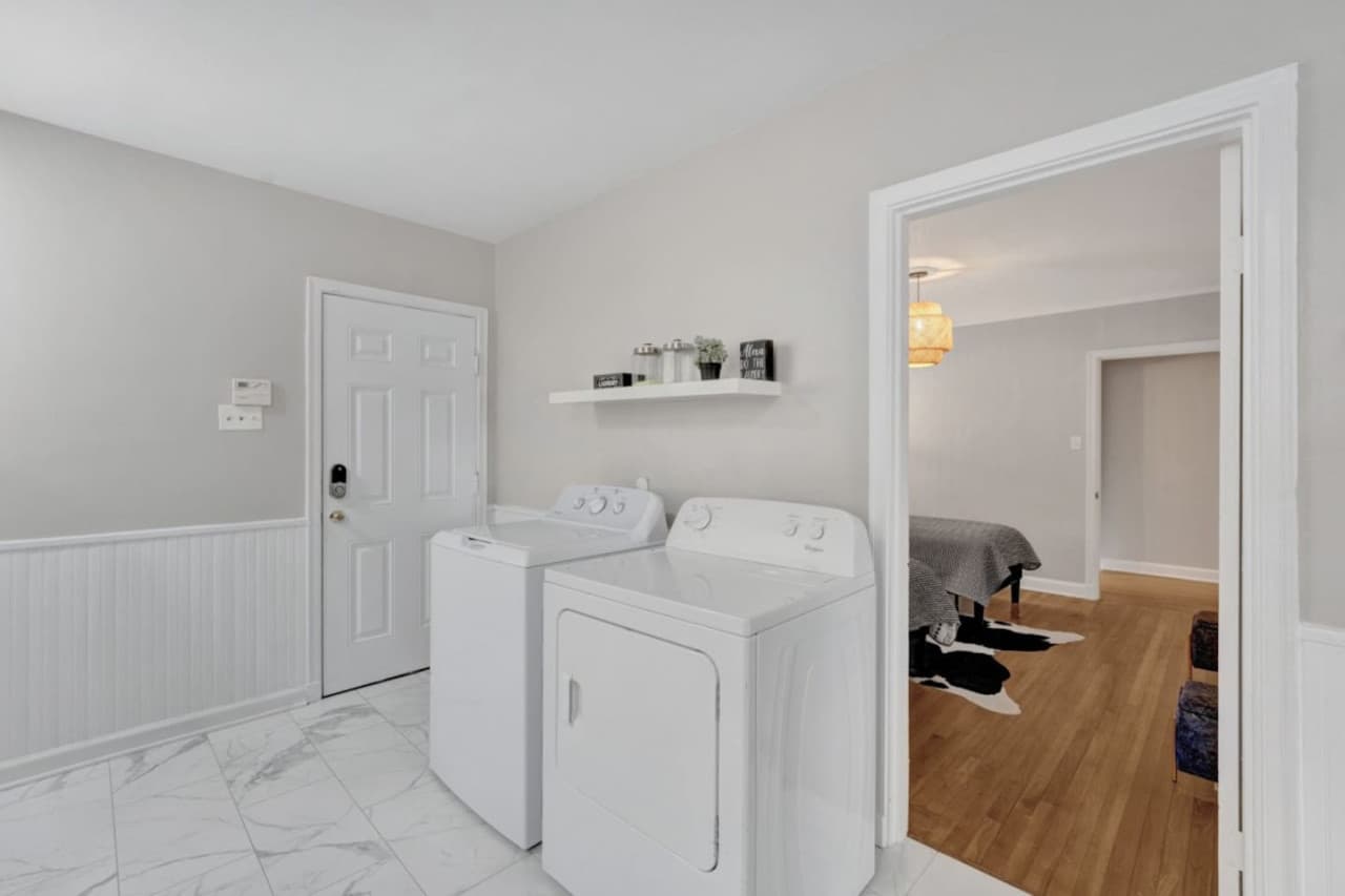 Laundry room off the third bedroom.