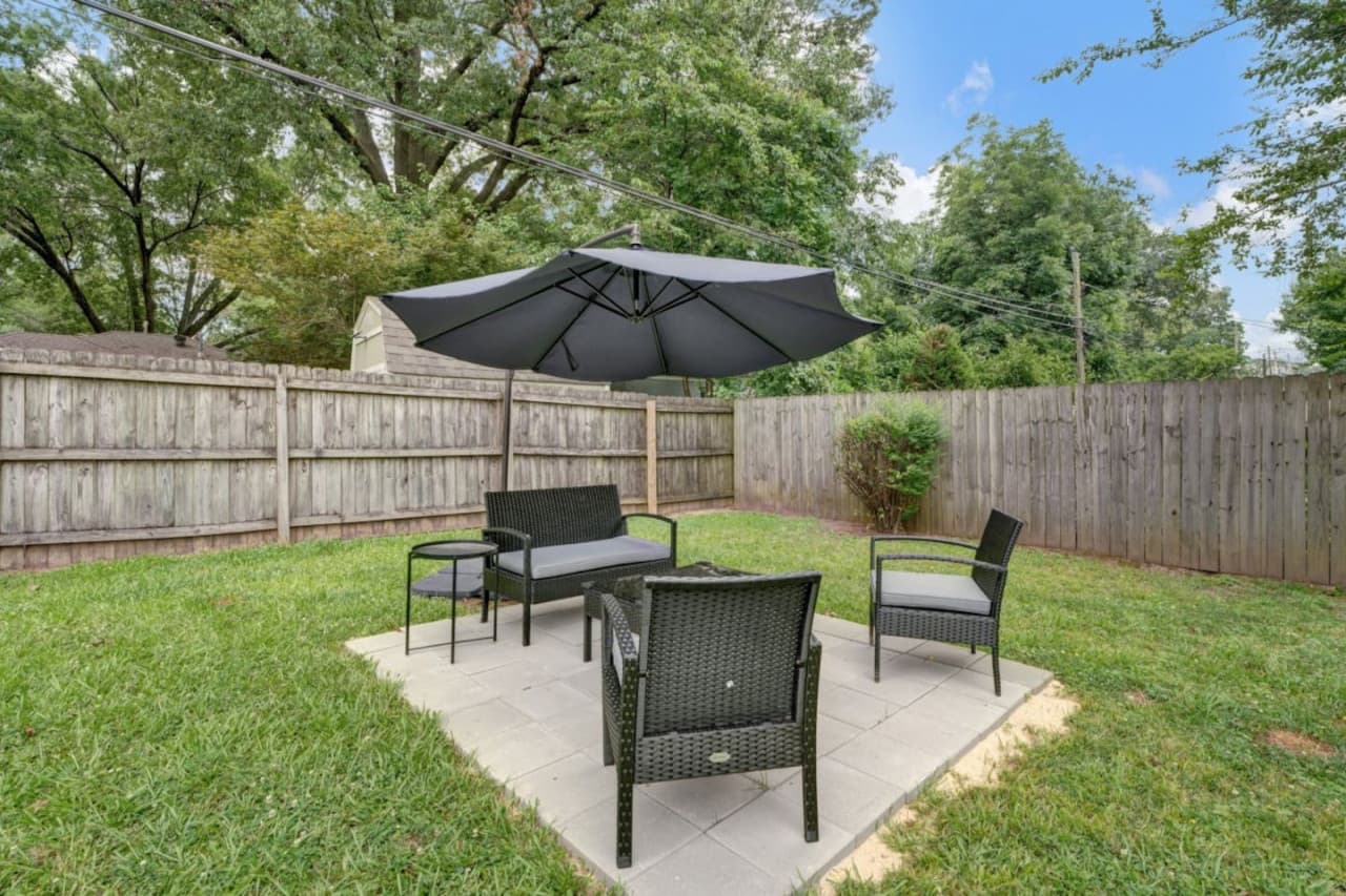 Indulge in the great outdoors right from our tranquil backyard featuring a seating area.