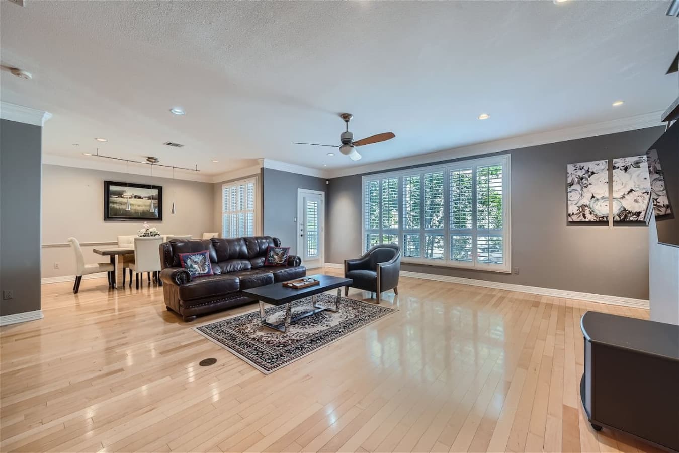 Open concept living room space and dining area.