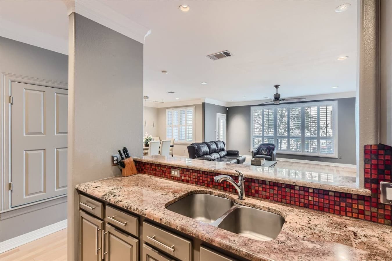 Open concept kitchen and living room space.