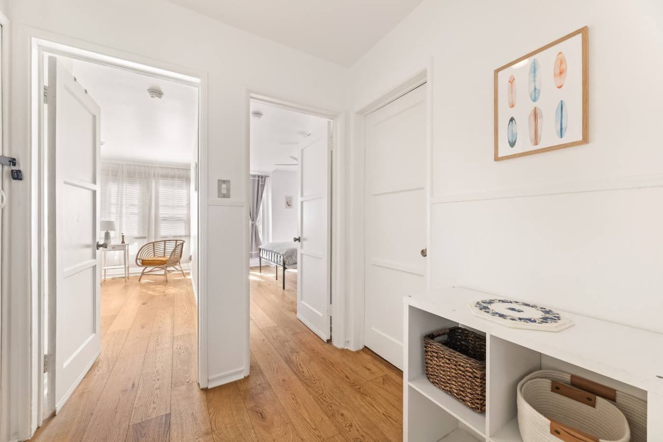 Clean hallway layout with easy access to bedrooms and shared spaces.