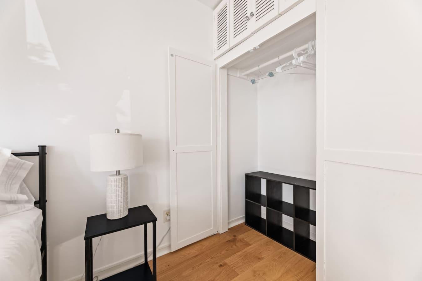 Dedicated closet area with additional shelving and convenient storage solutions.