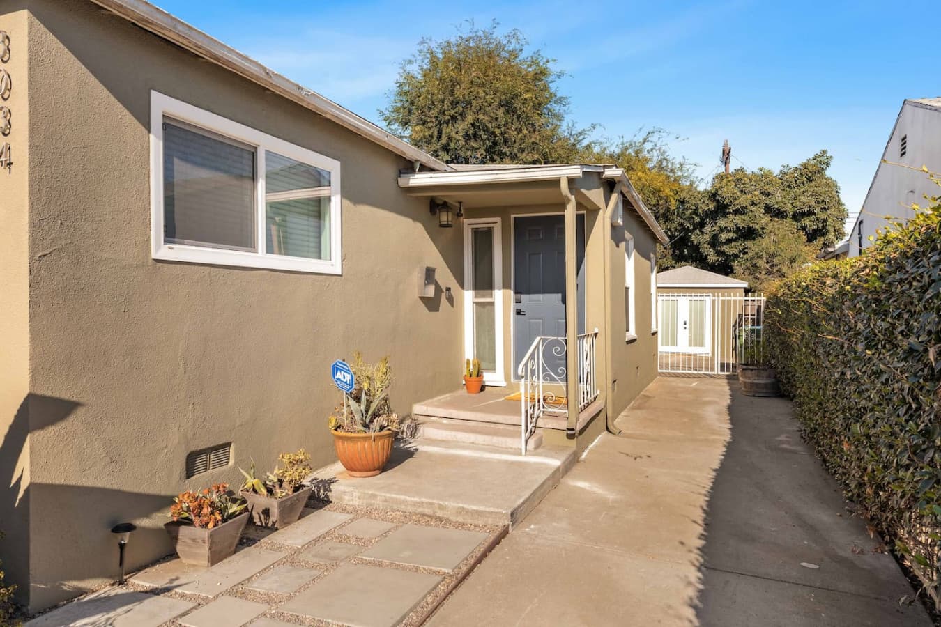 Inviting front entrance with clean lines and simple modern curb appeal.