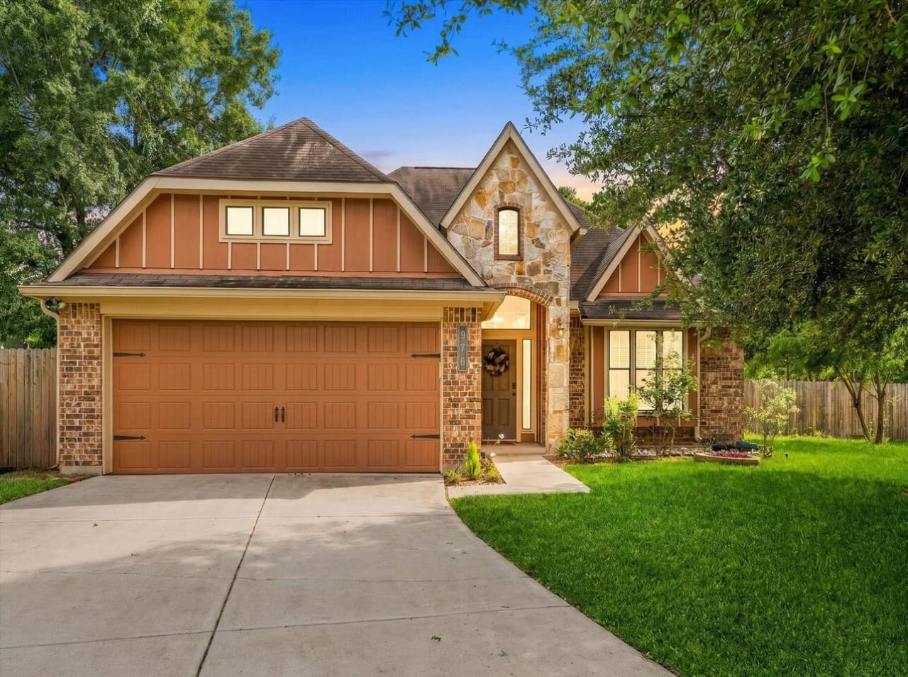 Beautiful exterior with charming curb appeal and a spacious driveway for easy parking.