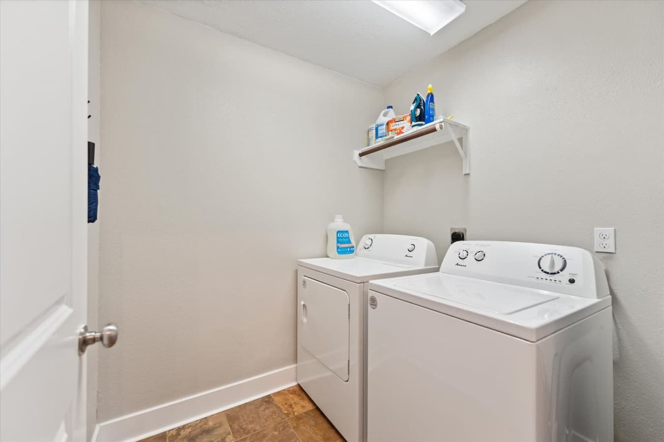Private laundry room with a washer and dryer available for added convenience during your stay.