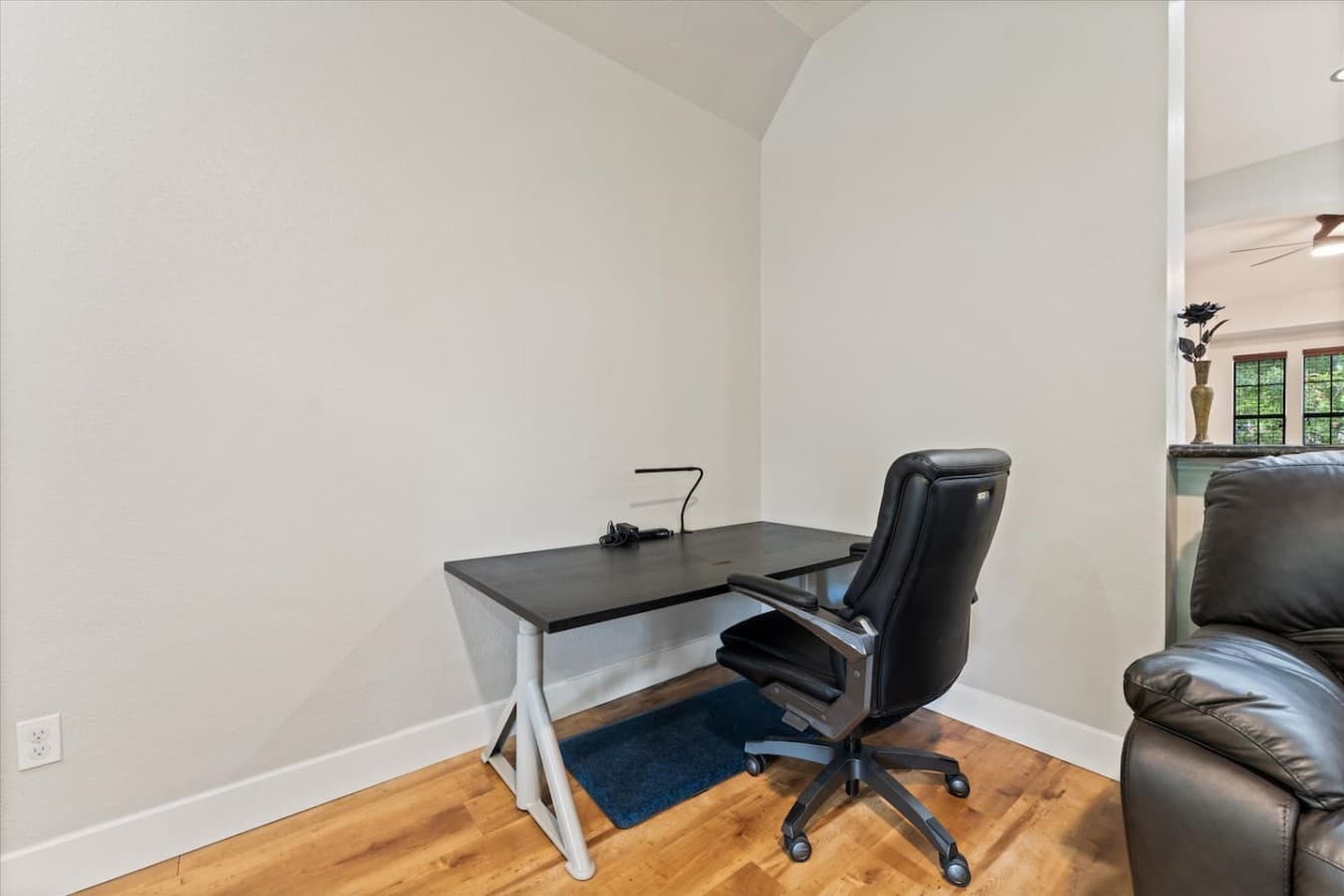 Dedicated workspace with a desk and chair perfect for remote work or catching up on emails.