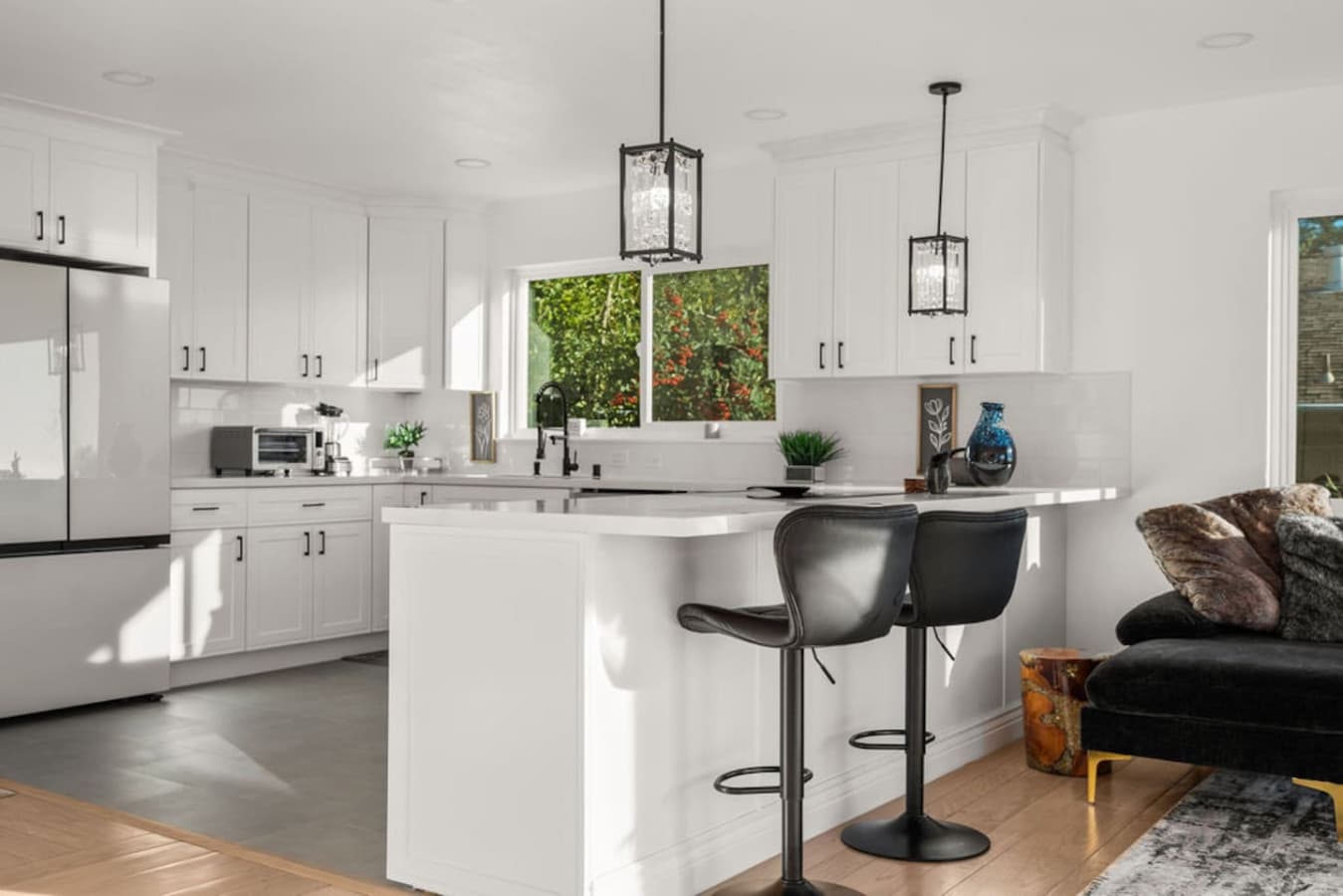 Open kitchen layout with a large island and bar seating for easy gathering.