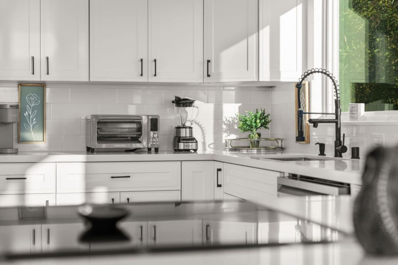 Close up of the kitchen amenities featuring essential appliances and a sleek design.