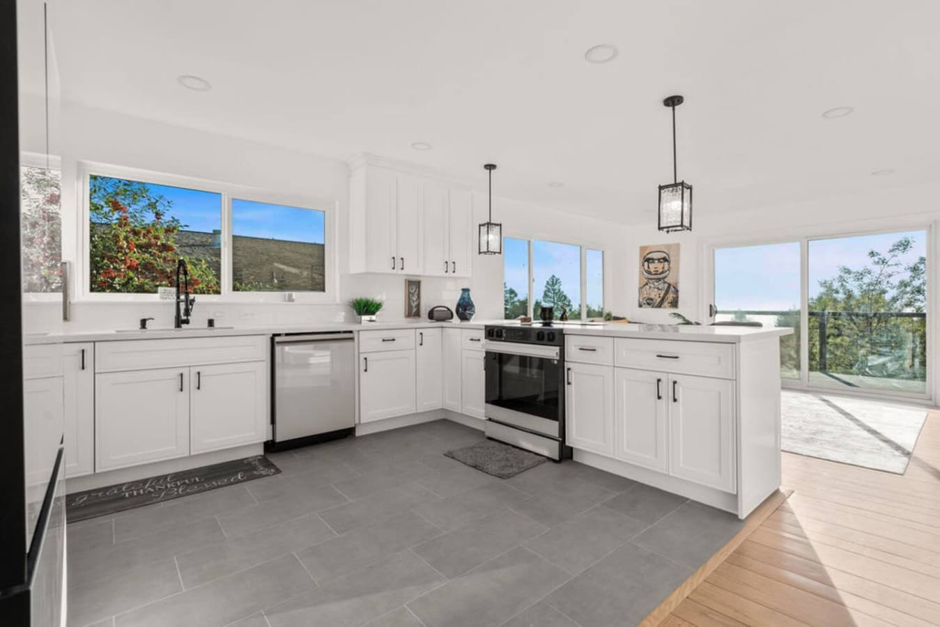 Expanded kitchen angle showing generous workspace and a comfortable cooking setup.