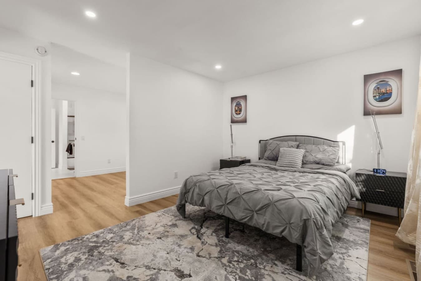 Open bedroom layout with neutral tones and plenty of room to settle in comfortably.