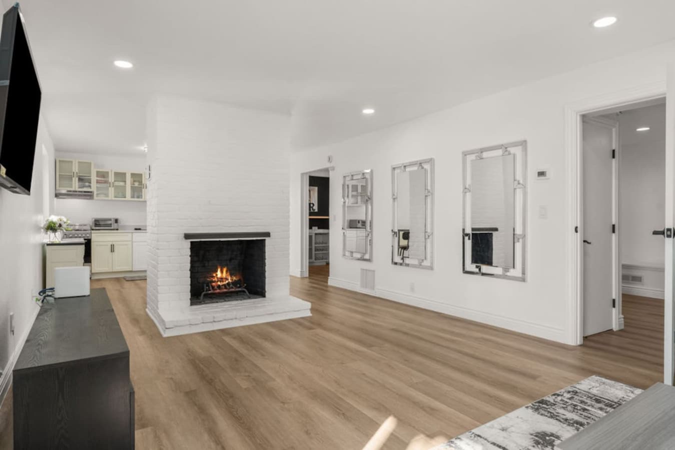 Additional view of the Private In Law Suite living room featuring a clean layout.