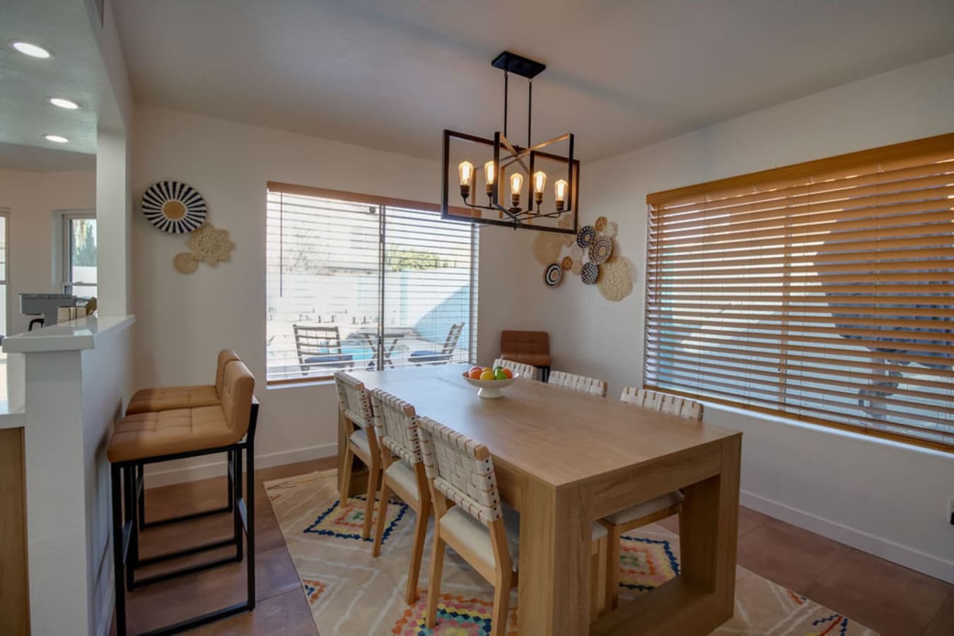 Dining space filled with natural light and easy access to the kitchen.