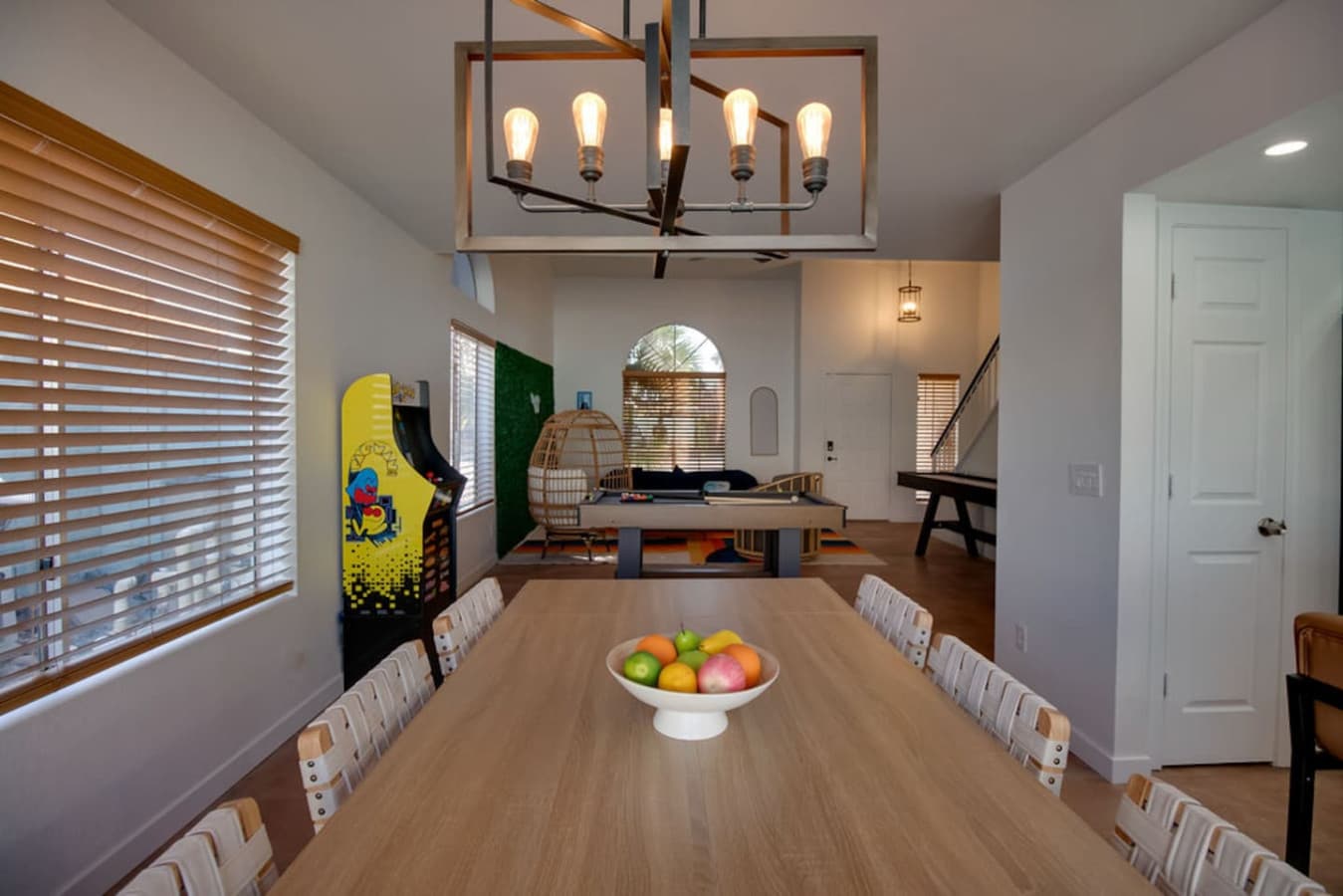 Open dining space with views into the game and living areas.