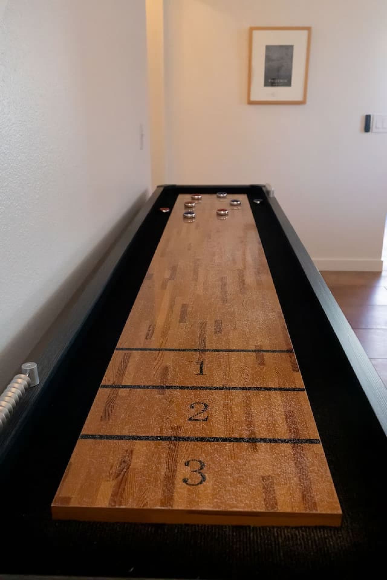 Shuffleboard table for relaxed indoor fun.