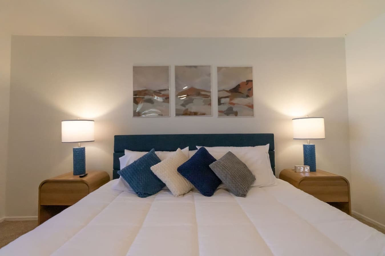 Inviting king bed with plush pillows and soft linens.