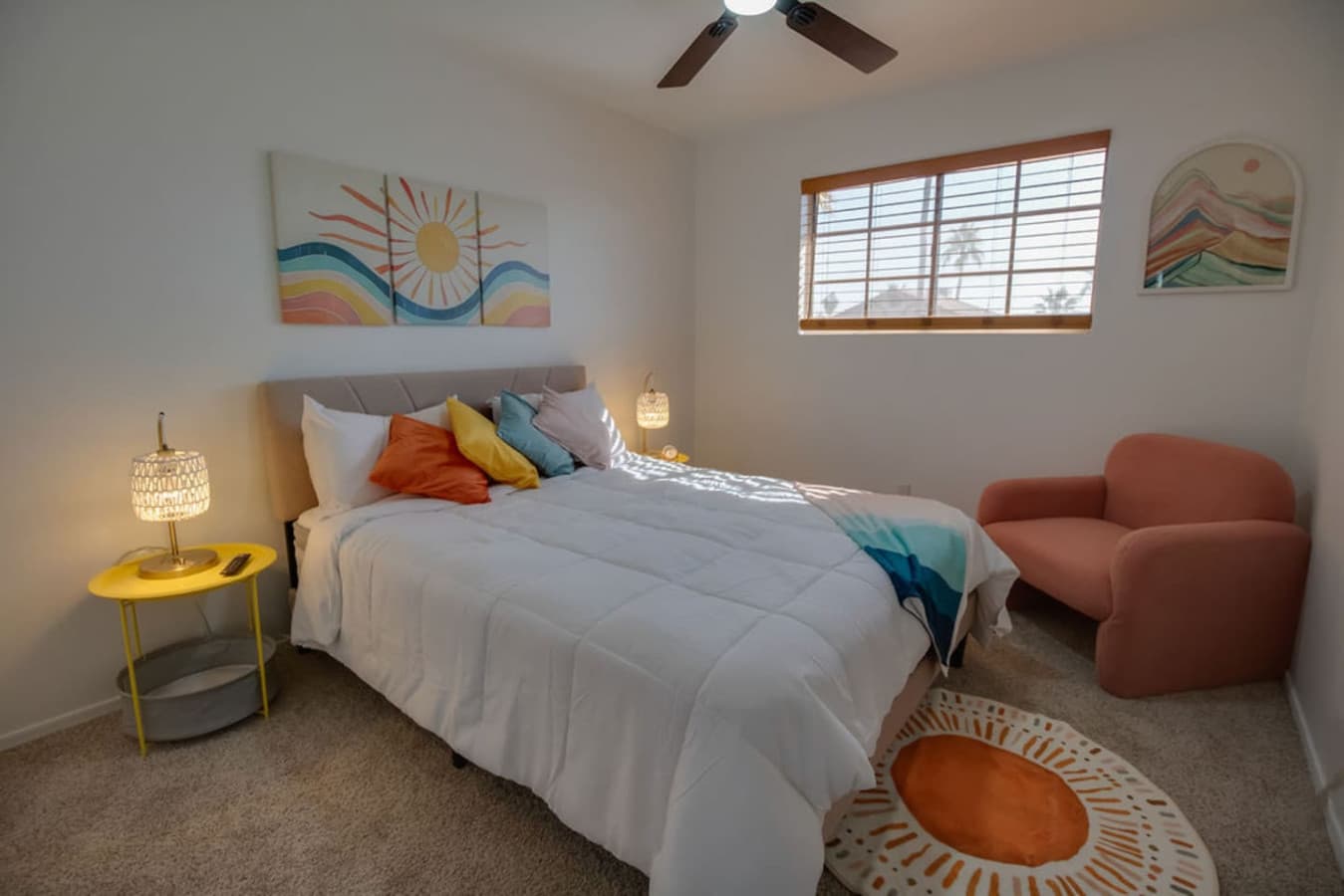 Cozy sleeping space with vibrant accents and natural light.