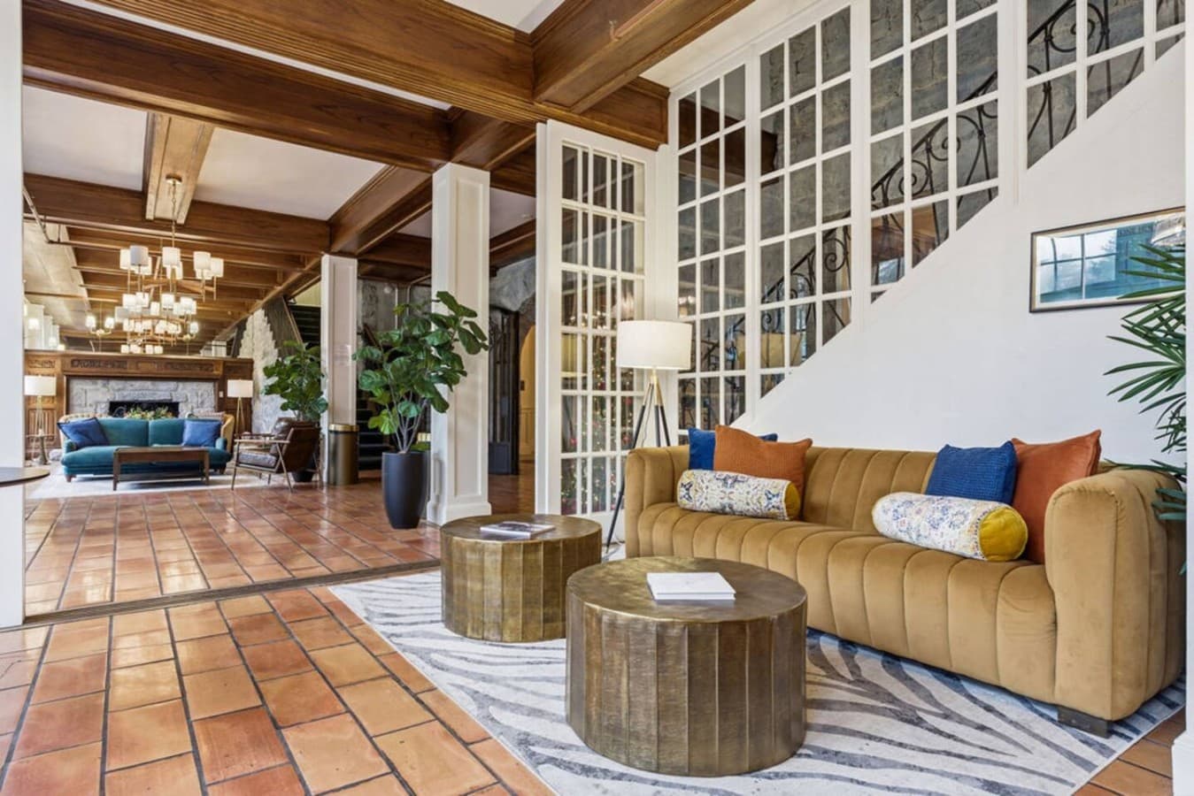 A bright shared lounge with comfortable seating and contemporary design elements offering a calm place to unwind.