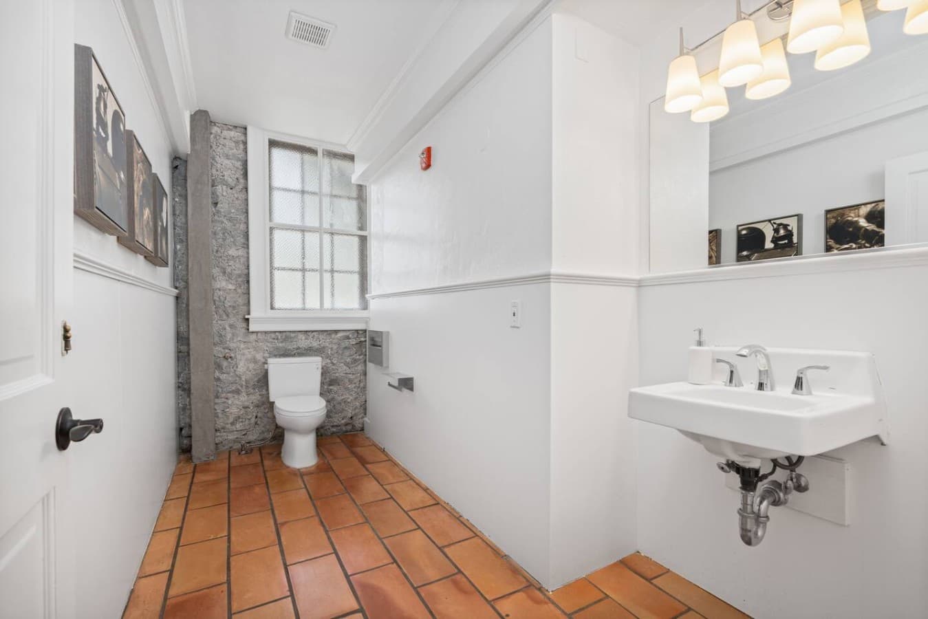 This is a shared half bathroom accessible from the hotel’s common spaces and not located inside your private room.