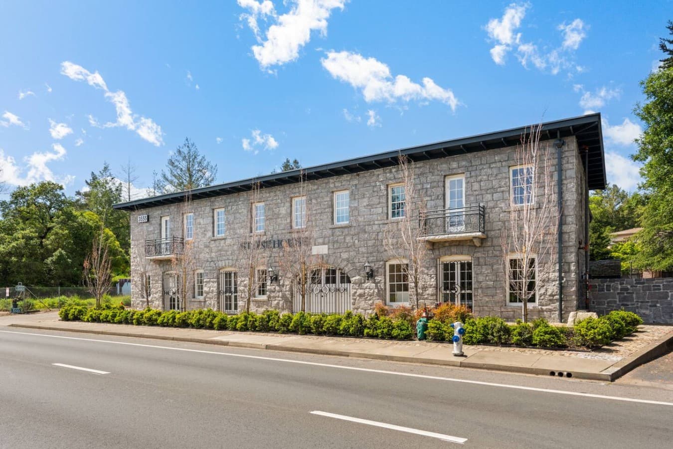 A full street-view perspective of the hotel showcasing its classic architecture and welcoming presence.