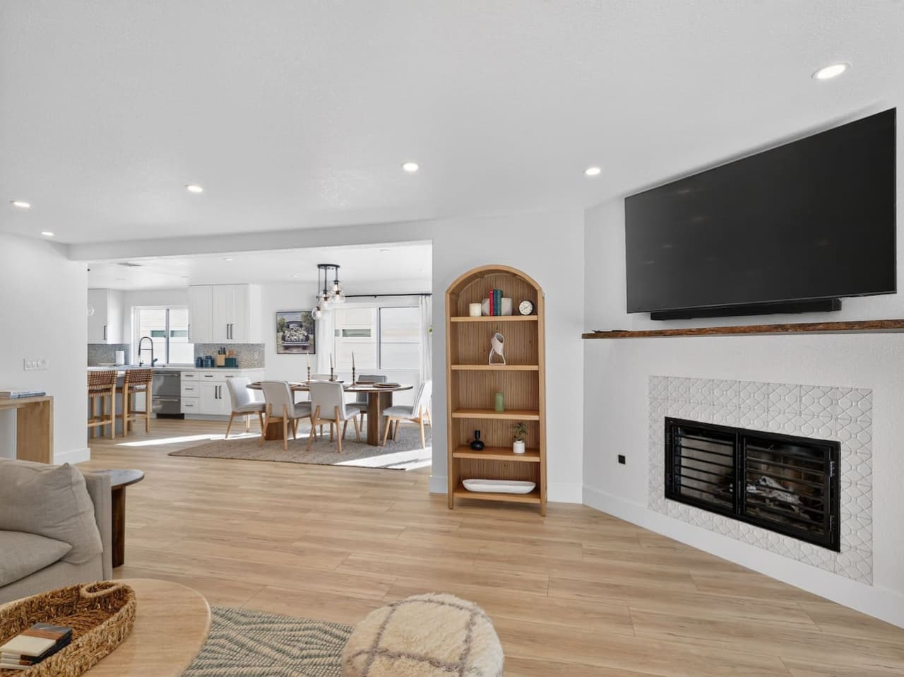 Inviting living area with fireplace and modern decor.
