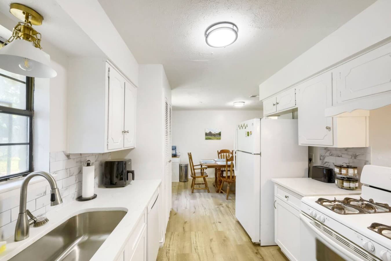 Open kitchen layout with seamless flow into the dining area for shared meals.
