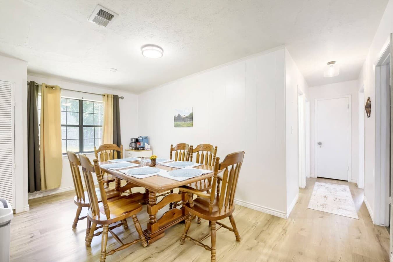 Comfortable dining setup with plenty of seating for shared meals together.