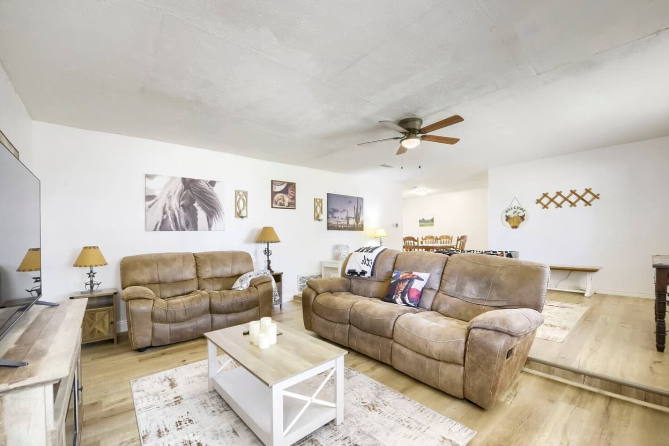Spacious lounge area with comfortable couches and bright open layout.