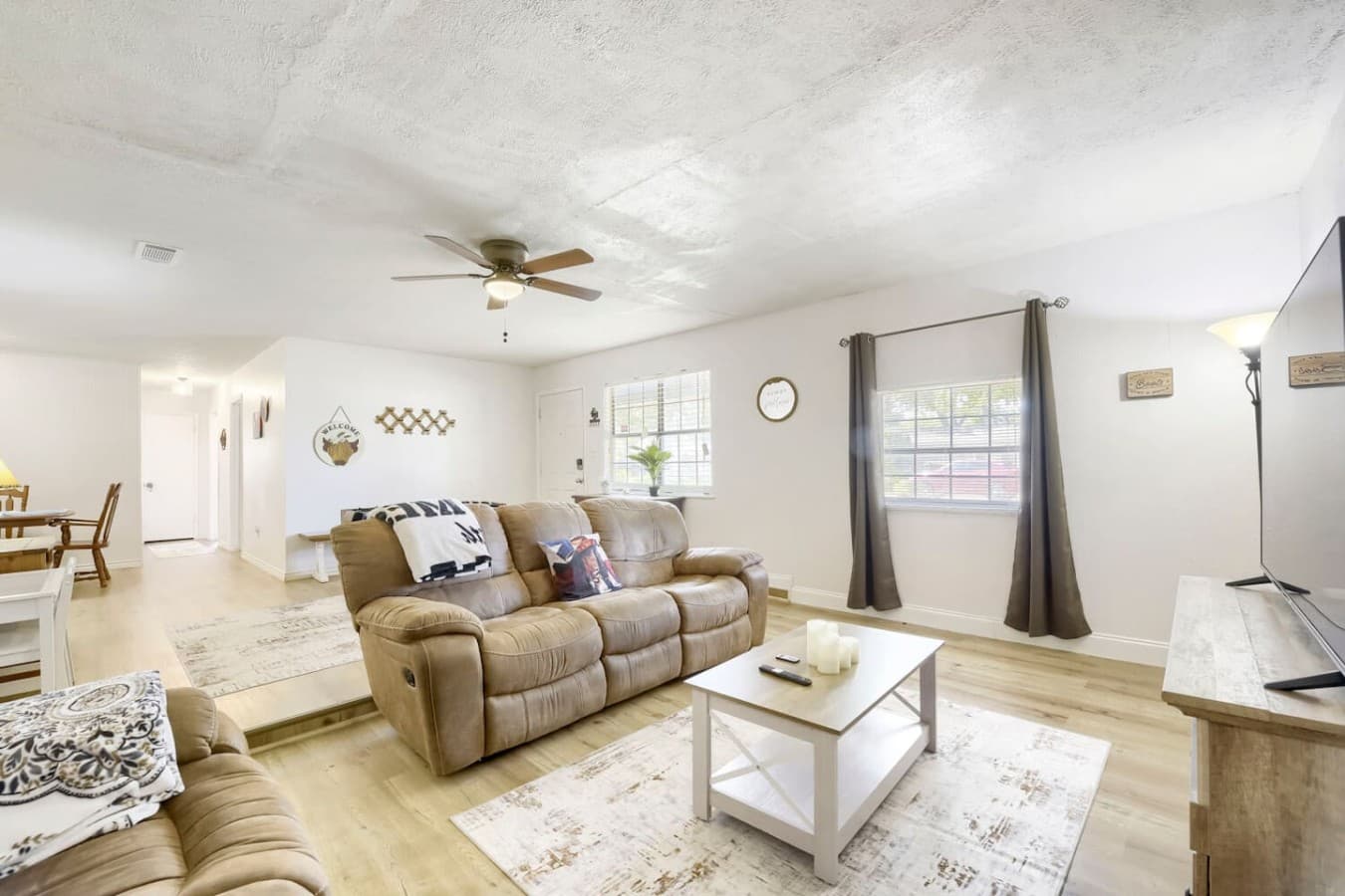 Inviting living space filled with natural light and relaxing seating areas.