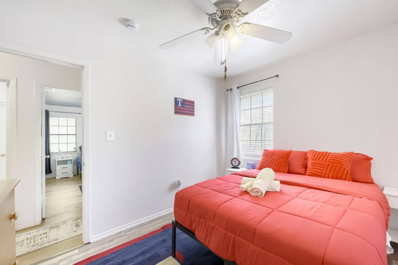 Bright bedroom featuring bold decor and cozy setup for restful nights.
