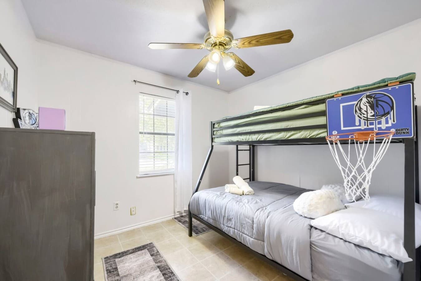 Fun bunk bedroom with comfortable sleeping space perfect for kids or groups.