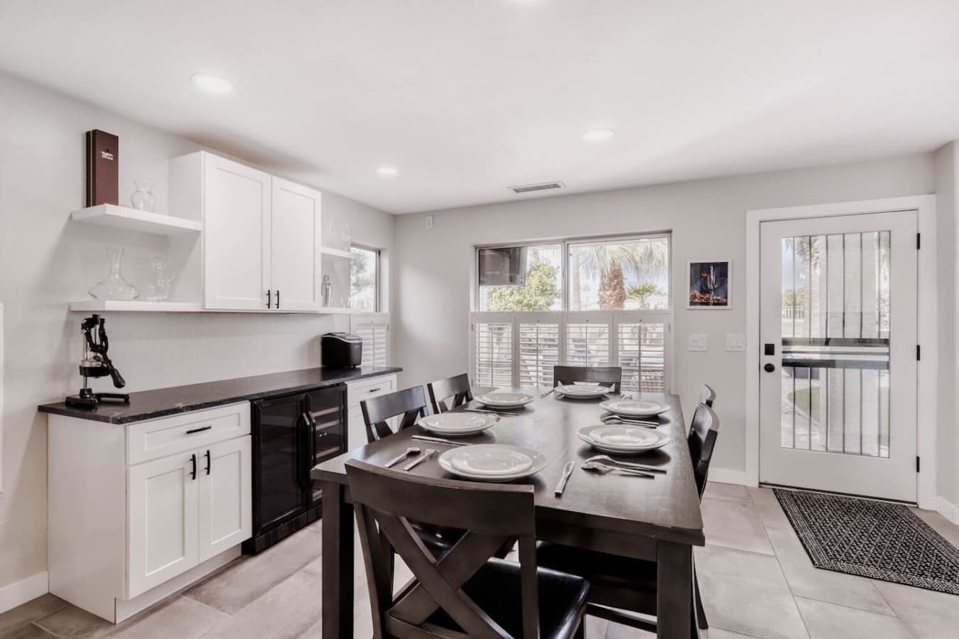 Open dining area set beside the kitchen with seating for shared meals and conversation.