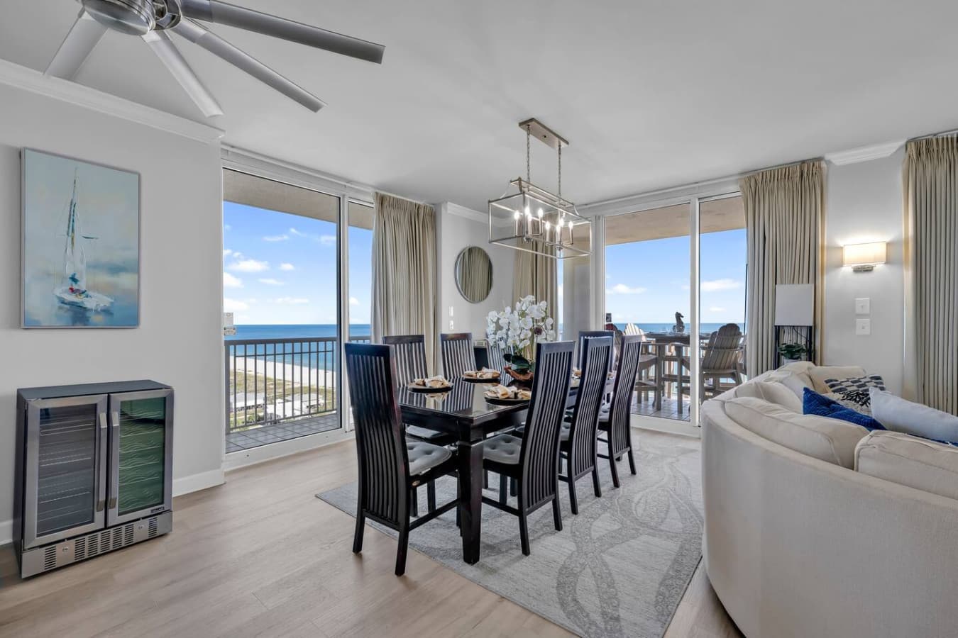 Elegant dining area with seating for the whole group and ocean views.