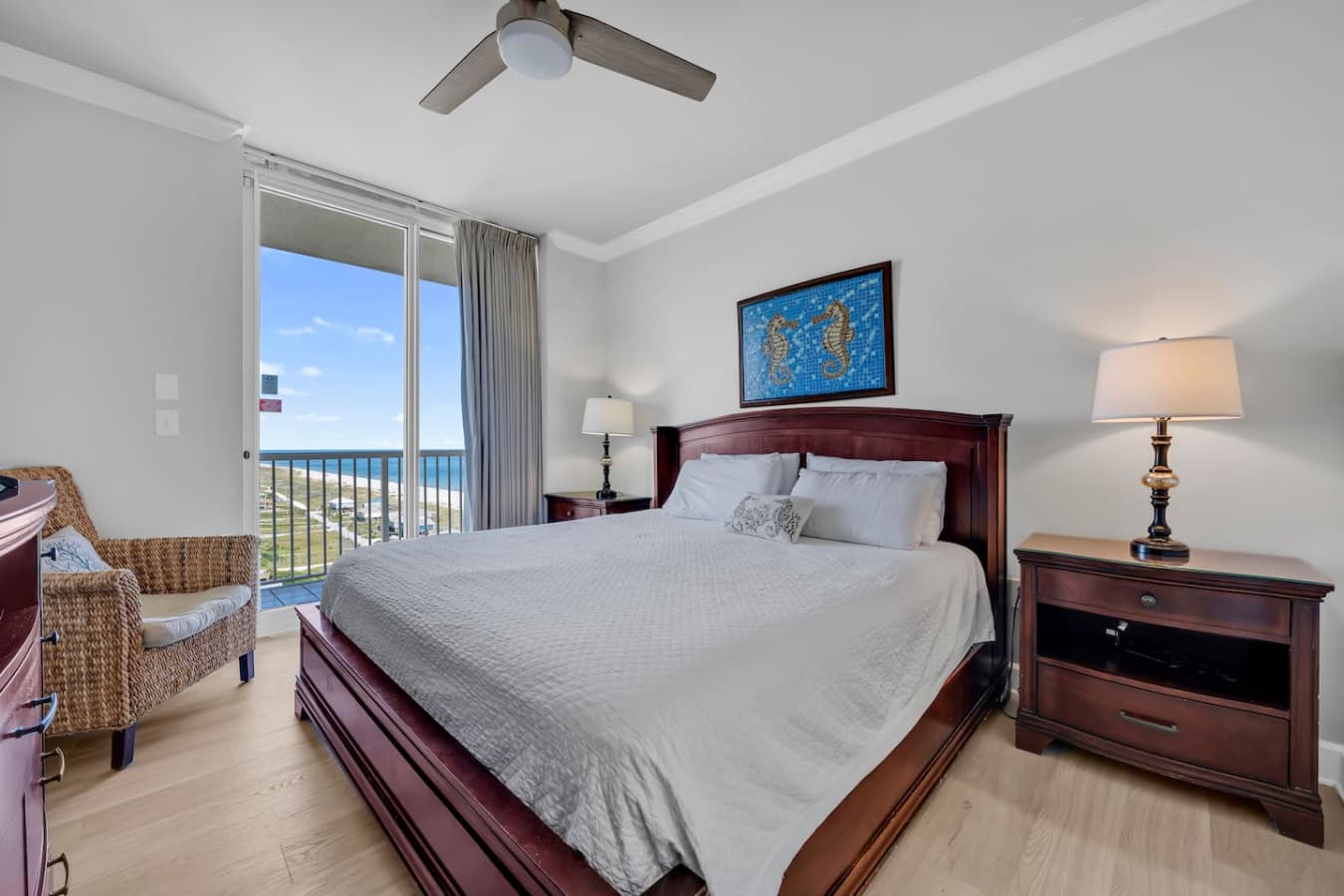 Inviting bedroom with king bed and calming coastal touches.