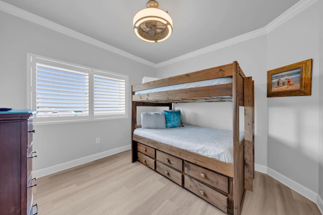 Fun bunk room with built in storage perfect for kids or groups.