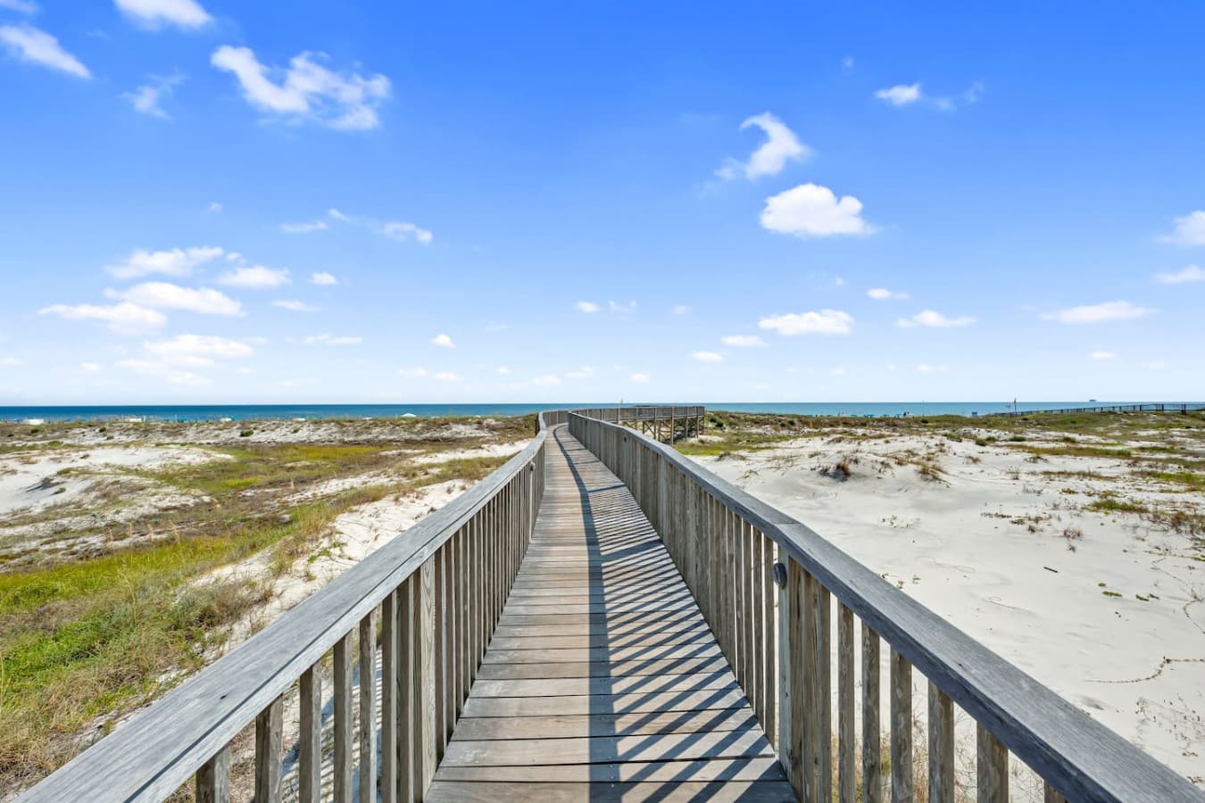Boardwalk leading directly to the beach for easy access.