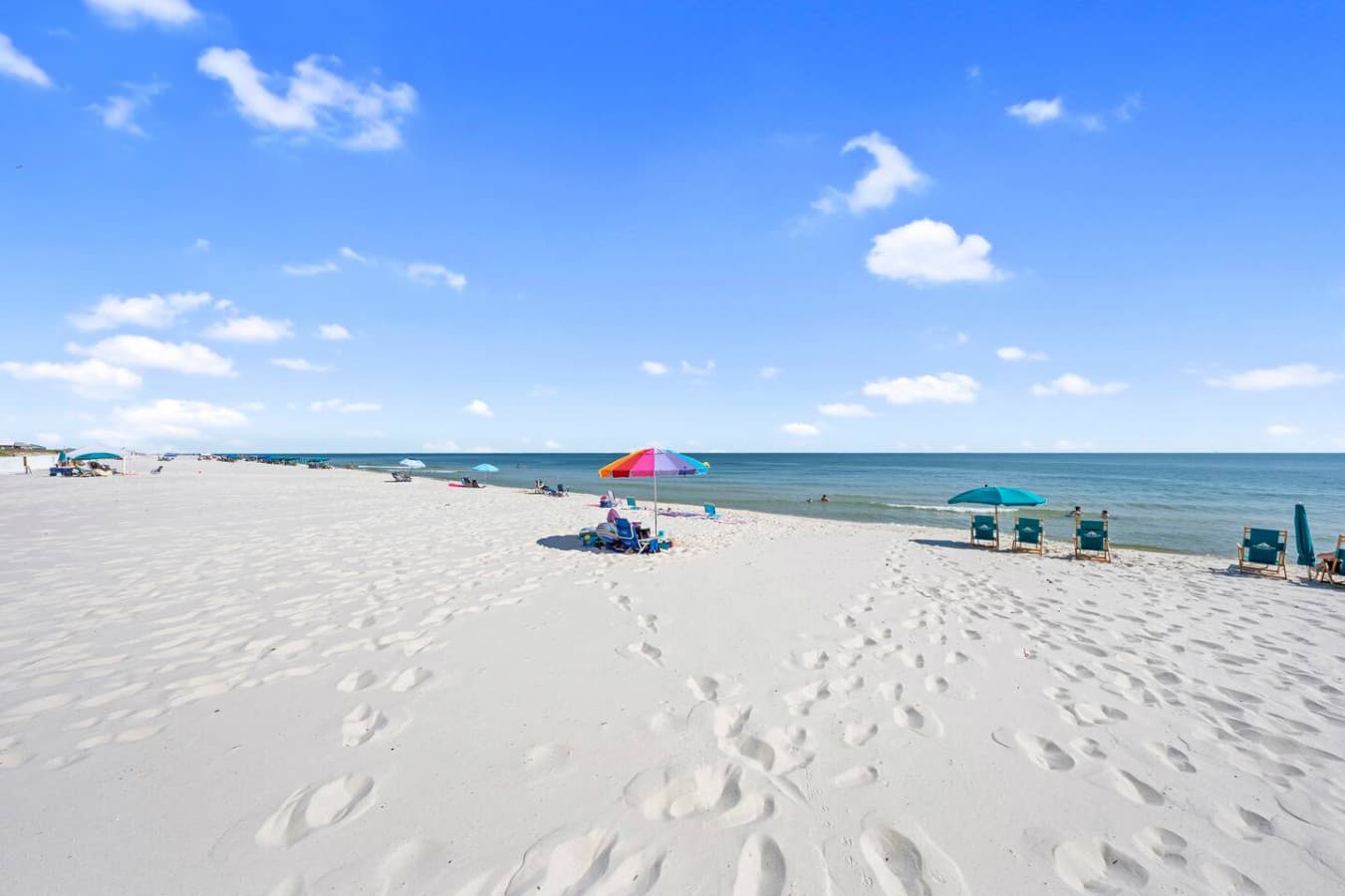 White sand beach just steps away from the property.