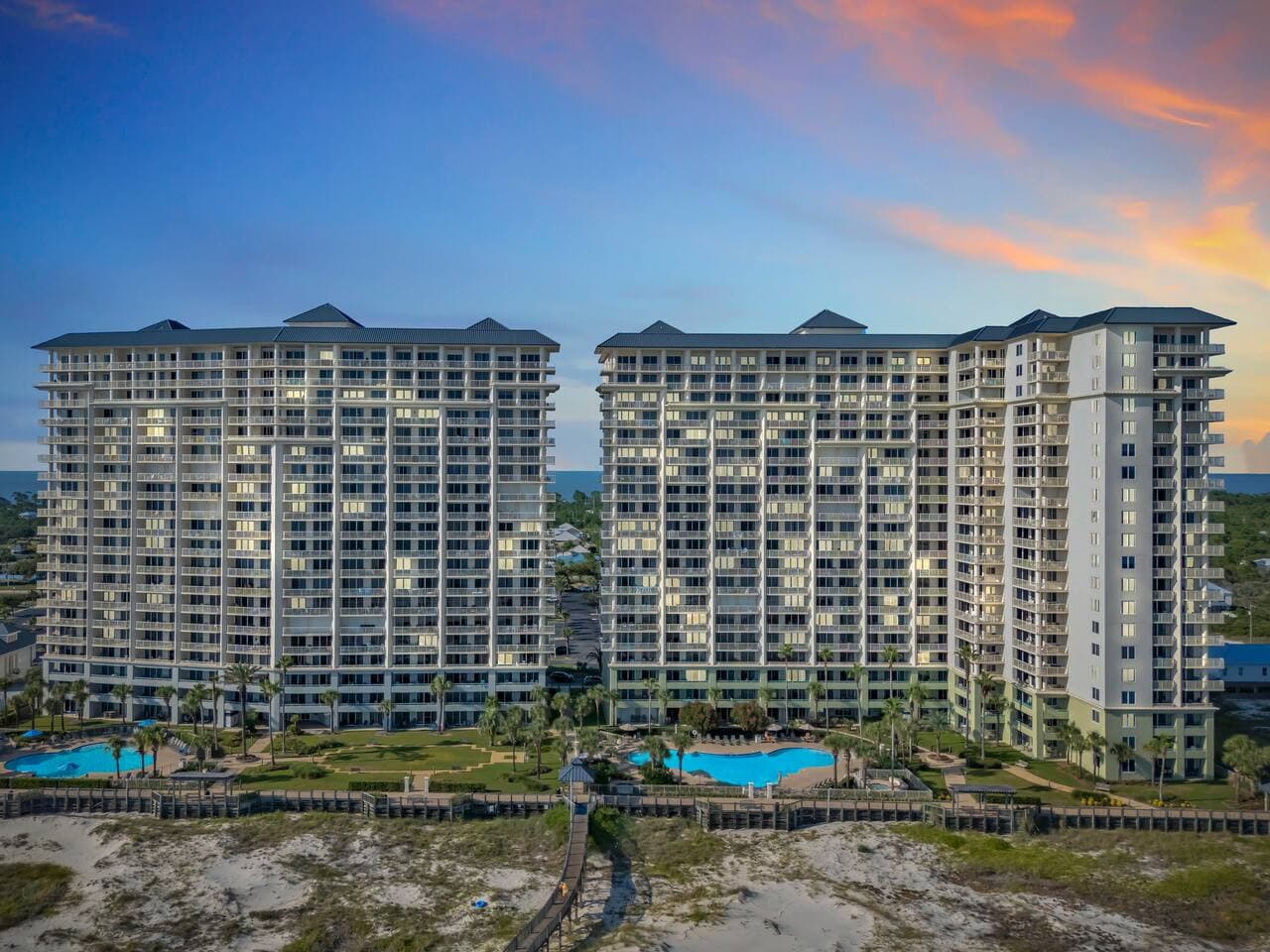 Resort style property with pool and direct beach access.