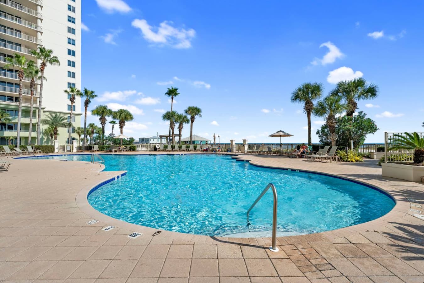 Spacious pool deck ideal for soaking up the sun.