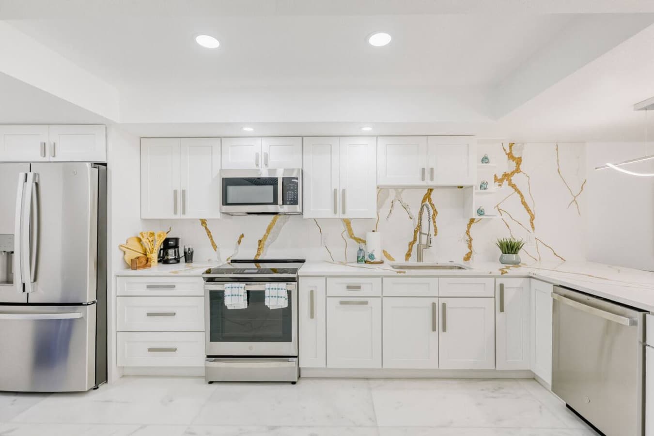 Modern kitchen featuring sleek finishes and stainless steel appliances.