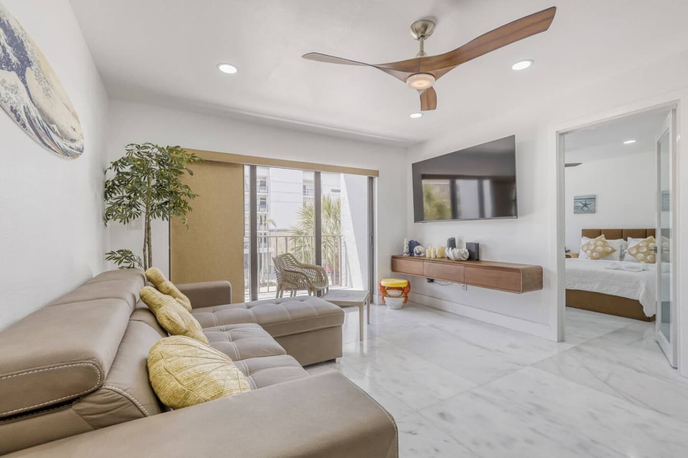 Relaxing living room with balcony access and contemporary design.