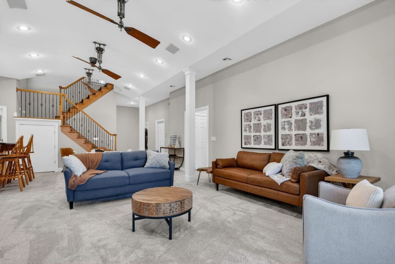 Comfortable lounge area with plush seating and an open airy layout perfect for relaxing together.