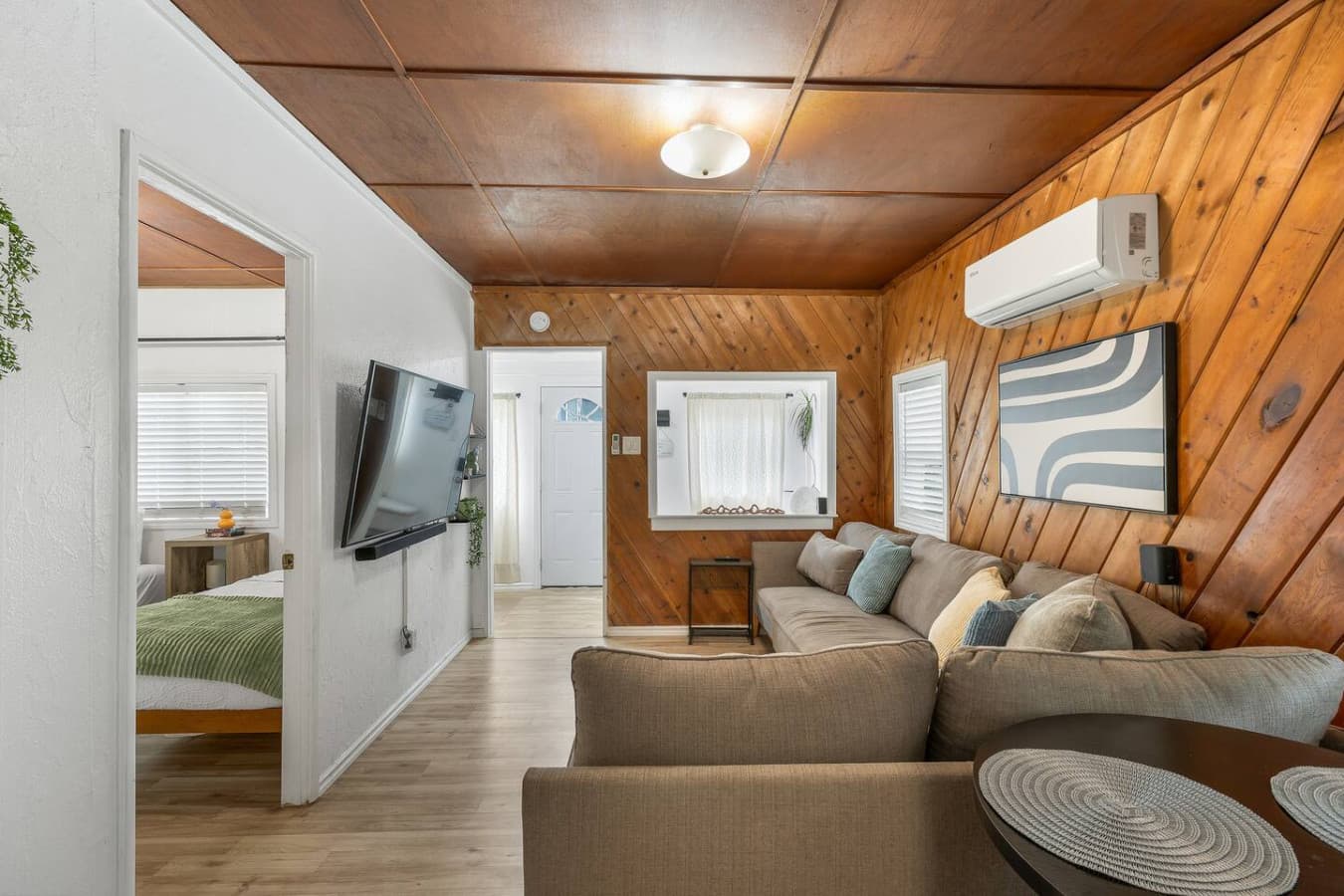 Enjoy your favorite shows in this cozy living room.