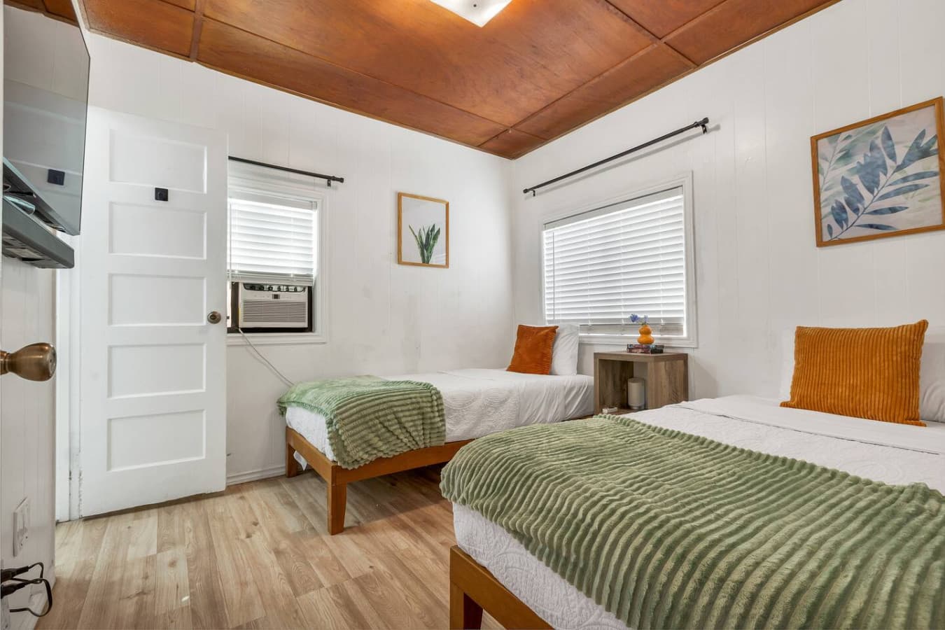 Second bedroom with two single beds for comfort.