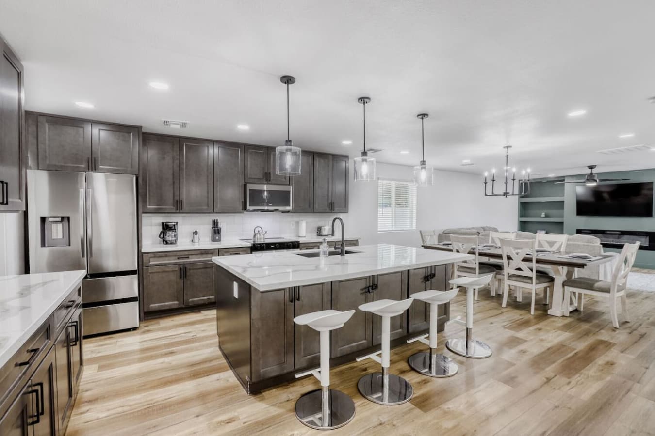 Kitchen island with seating and dining area.