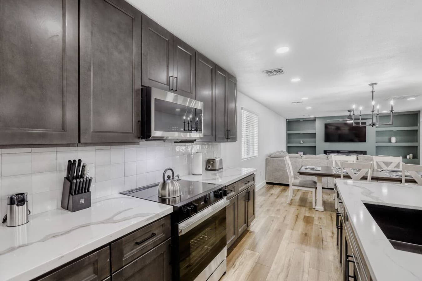 Fully equipped kitchen with modern appliances.