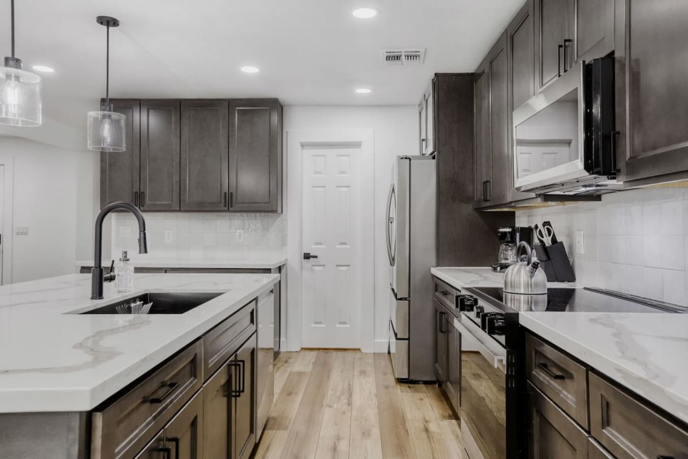 Bright kitchen with clean lines and ample storage.